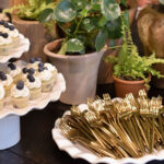 MANY PANCAKES ON A STAND WITH FORK