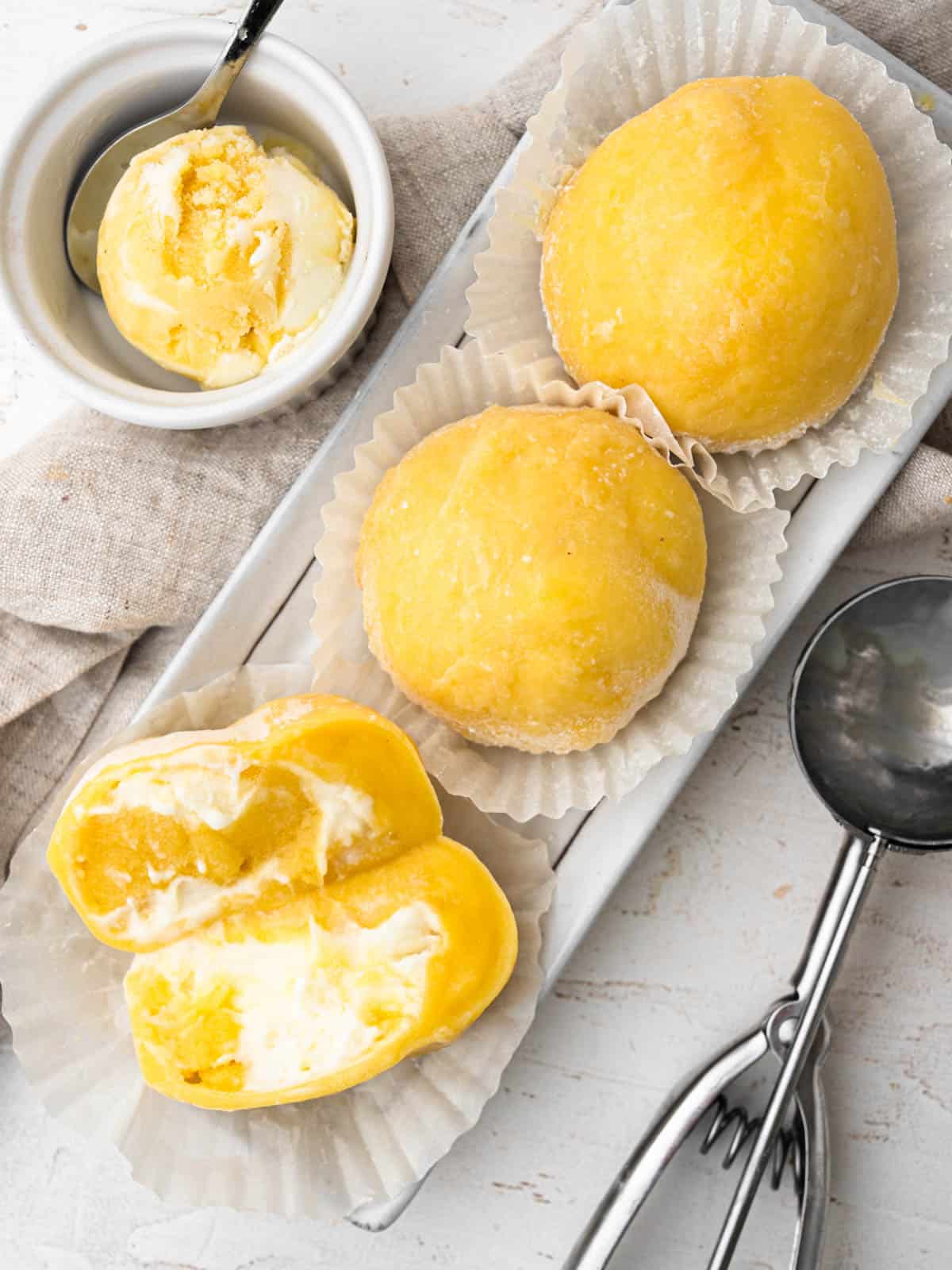 SOFT MANGO MOCHI GARNISHED WITH COCONUT POWDER FILLED IN MANGO PULP 